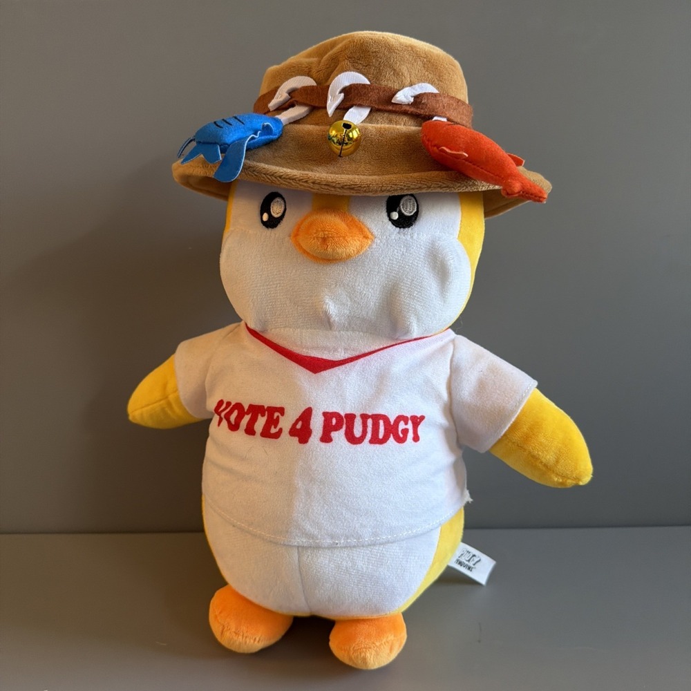 Pudgy Penguins Huggable Plush "Fisherman Flynn" Yellow White Vote Fish Hat